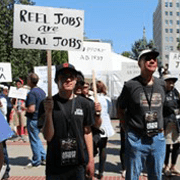 Reel Jobs are Real Jobs sign at protest