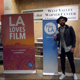 FilmLA & LA Loves Film signs and representative