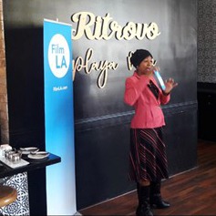 FilmLA sign and representative speaking