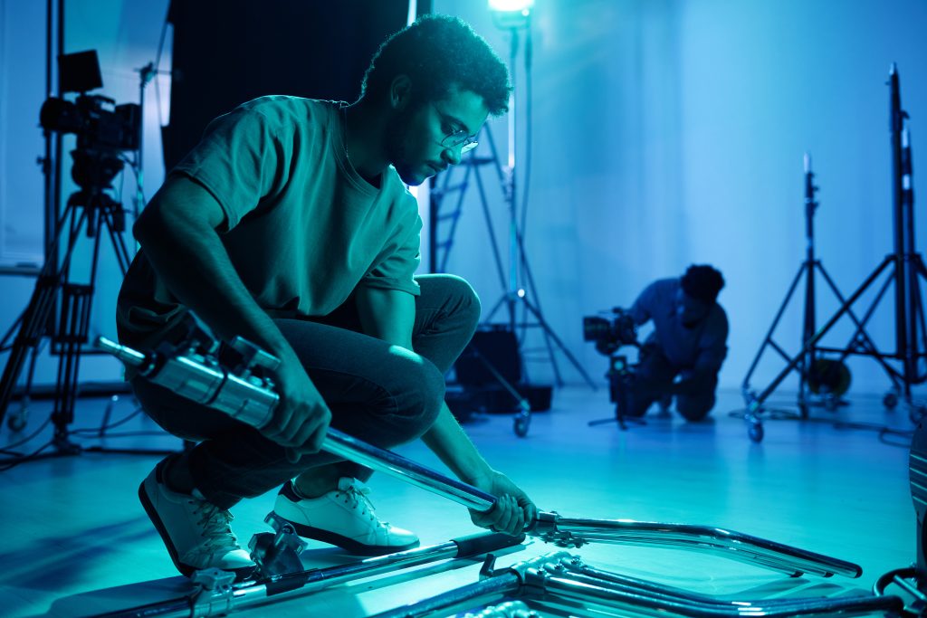 filmmakers in a studio with equipment
